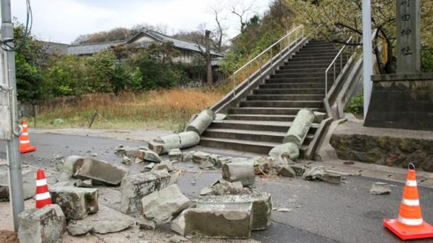 A stone torii gate damaged by an earthquake in Ohda, Japan, on Monday.(Kyodo via Reuters)