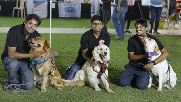 Abhishek Khemka (L), Rajeev Kumar and Jay Mistry (R) had organised the PetYo festival Pune 2018 at Amanora Club House in Pune on April 8. The event was the fulfilment of their mission to connect pets with pet-lovers, doctors and professionals. (RAHUL RAUT/HT PHOTO)