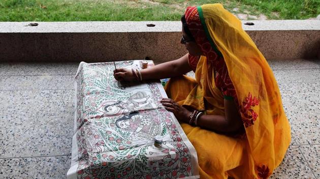 Artist Kalpana Singh demonstrates the Mithila or Madhubani painting style on a silk cloth in Bihar. An initiative under the ‘Rail Swacch Mission,’ about 225 artists, 80% of them women volunteered to spruce up the station over a period of two months, free of cost. (Prakash Singh / AFP) Artist Kalpana Singh demonstrates the Mithila or Madhubani painting style on a silk cloth in Bihar. An initiative under the ‘Rail Swacch Mission,’ about 225 artists, 80% of them women volunteered to spruce up the station over a period of two months, free of cost. (Prakash Singh / AFP)