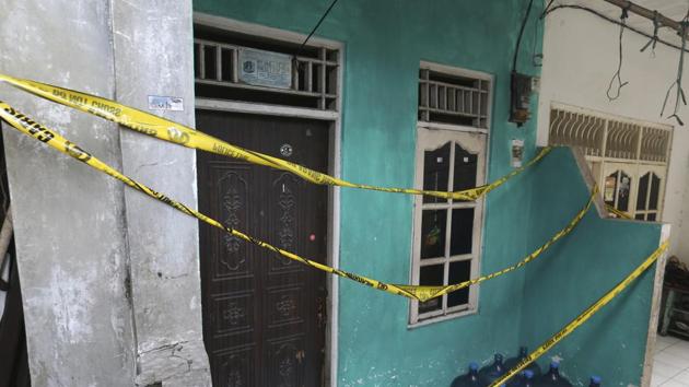 Police tape covers a home-based alcohol factory in Jakarta, Indonesia, Monday.(AP File Photo)