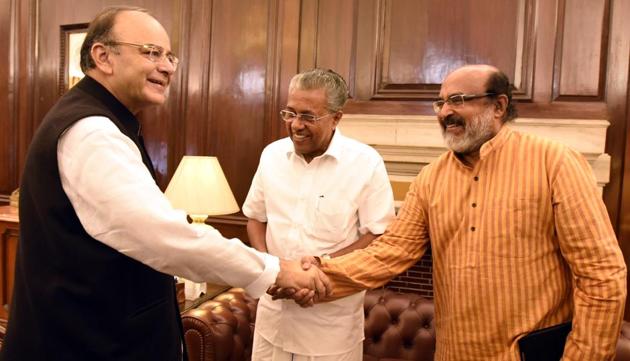 Kerala chief minister Pinarayi and his finance minister Thomas Isaac (right) meeti with union finance minister Arun Jaitley in Delhi in this file photo. (Sonu Mehta/HT file photo) Kerala chief minister Pinarayi and his finance minister Thomas Isaac (right) meeti with union finance minister Arun Jaitley in Delhi in this file photo. (Sonu Mehta/HT file photo)