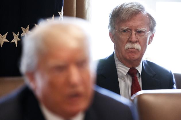 National security adviser John Bolton (right) looks on as US president Donald Trump speaks to reporters. (NYT) National security adviser John Bolton (right) looks on as US president Donald Trump speaks to reporters. (NYT)