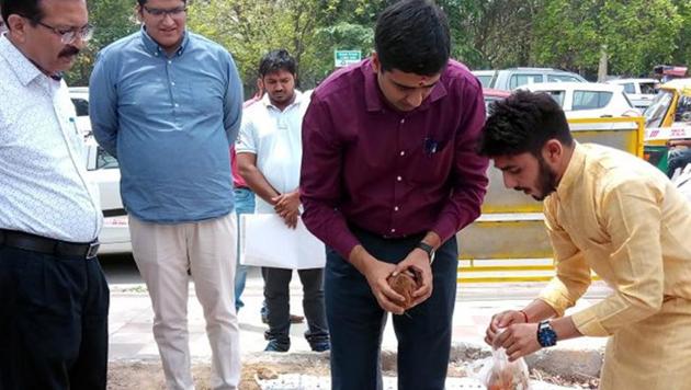 Chandra Shekhar Khare, the chief executive officer of the Gurugram Metropolitan City Bus Limited (GMCBL), who is also the Huda administrator, laid the foundation stone for bus queue shelters at HUDA City Centre Metro station, in Gurugram, on Monday.(HT PHOTO)