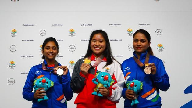 Mehuli Ghosh (L) and Apurvi Chandela (R) finished behind Singapore's Martina Lindsay Veloso to win the silver and bronze medals, respectively, in women’s 10m air rifle. (AFP) Mehuli Ghosh (L) and Apurvi Chandela (R) finished behind Singapore's Martina Lindsay Veloso to win the silver and bronze medals, respectively, in women’s 10m air rifle. (AFP)
