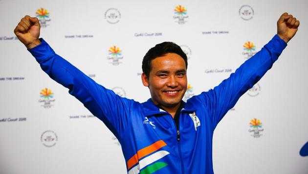 Jitu Rai celebrates winning gold in the men's 10m air pistol shooting final during the 2018 Gold Coast Commonwealth Games at the Belmont Shooting Complex in Brisbane, Australia. Pardeep Singh settled for silver in the men’s 105kg weightlifting final and Apurvi Chandelas for bronze in the women’s 10m air rifle shooting final. (Patrick Hamilton / AFP) 