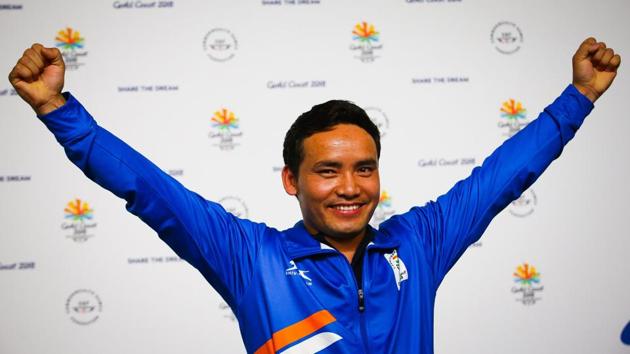 Jitu Rai celebrates after winning the gold medal in the men's 10m air pistol shooting event at the 2018 Commonwealth Games (CWG 2018) at the Belmont Shooting Complex in Gold Coast on Monday.(AFP)