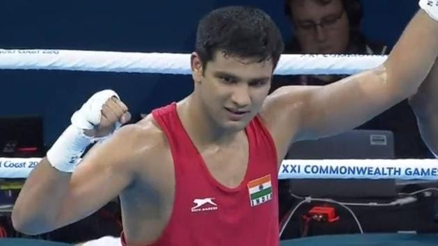 Naman Tanwar outclassed Samoa’s Frank Masoe in the heavyweight (91kg) division. Both Tanwar and Panghal are assured of bronze medals at least. (twitter)