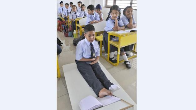 Kamaljit Singh in his new class at Golden Earth Convent School at Pandori village near Mullanpur in Ludhiana on Monday.(Gurminder Singh/HT)