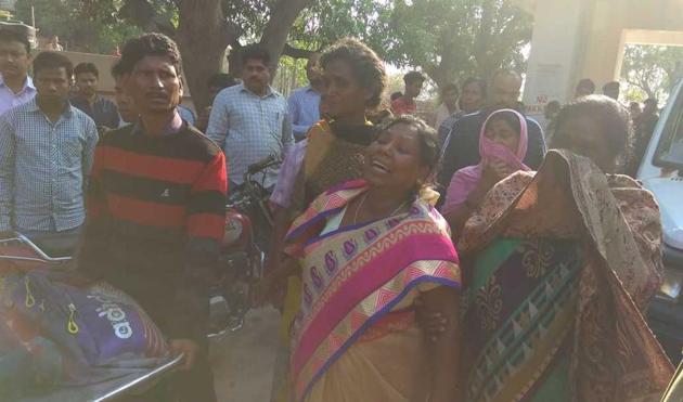 Grieving relatives of the victims outside Simdega Sadar hospital on Tuesday.(HT Photo)