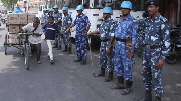 Security personnel stand guard in Rajasthan’s Jaipur during the Bharat Bandh on Tuesday. (HT Photo) Security personnel stand guard in Rajasthan’s Jaipur during the Bharat Bandh on Tuesday. (HT Photo)