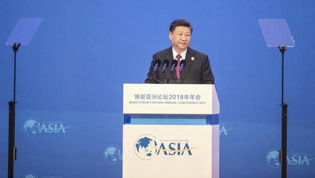 Xi Jinping, China's president, speaks at the Boao Forum for Asia Annual Conference in Boao, China, on Tuesday, April 10, 2018. Xi vowed to open sectors from banking to auto manufacturing, in a keynote speech that also warned against returning to a "Cold War mentality" amid his trade disputes with US counterpart Donald Trump.(Qilai Shen/Bloomberg)