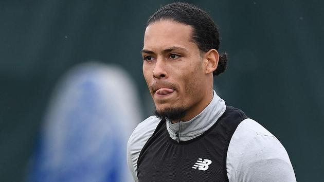 Virgil van Dijk at a training session on the eve of the UEFA Champions League second leg quarter-final football match between Manchester City and Liverpool, at Melwood in Manchester on April 9, 2018. (AFP) Virgil van Dijk at a training session on the eve of the UEFA Champions League second leg quarter-final football match between Manchester City and Liverpool, at Melwood in Manchester on April 9, 2018. (AFP)