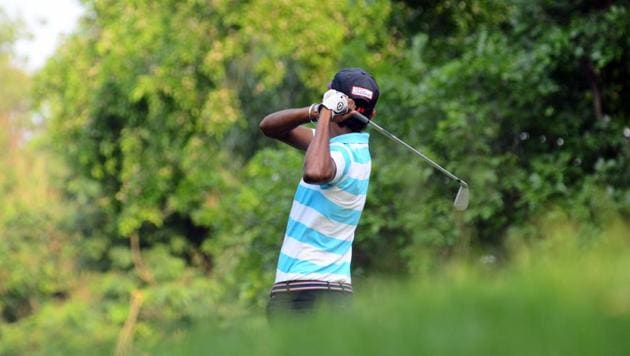 A participant in action during the PGTI tournament on Tuesday. (Shankar Narayan/HT PHOTO) A participant in action during the PGTI tournament on Tuesday. (Shankar Narayan/HT PHOTO)