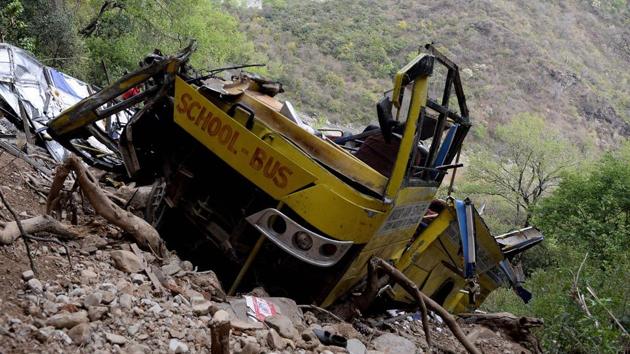 A wrecked school bus near Nurpur in Kangra District, Himachal Pradesh, a day after a bus accident that killed at least 30 people. At least 30 people, including 27 children, were killed April 9 in northern India when a school bus plunged into a deep ravine in the Himalayan foothills. (Shammi Mehra / AFP) A wrecked school bus near Nurpur in Kangra District, Himachal Pradesh, a day after a bus accident that killed at least 30 people. At least 30 people, including 27 children, were killed April 9 in northern India when a school bus plunged into a deep ravine in the Himalayan foothills. (Shammi Mehra / AFP)
