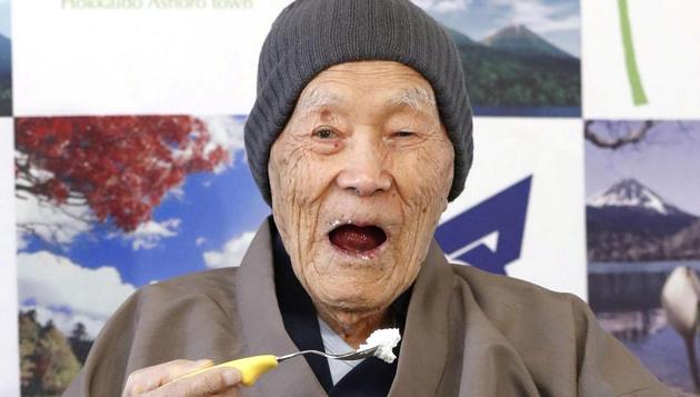Japanese Masazo Nonaka, who is 112 years old, eats his favourite cake as he receives a Guinness World Records certificate naming him the world’s oldest man during a ceremony in Ashoro on Monday.(Reuters Photo) Japanese Masazo Nonaka, who is 112 years old, eats his favourite cake as he receives a Guinness World Records certificate naming him the world’s oldest man during a ceremony in Ashoro on Monday.(Reuters Photo)