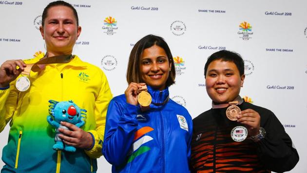 (L to R) Silver medallist Australia's Elena Galiabovitch, gold medallist India's Heena Sidhu and bronze medallist Malaysia's Alia Sazana Azahari on the podium at the awards ceremony following the women's 25m pistol shooting final. (AFP)
