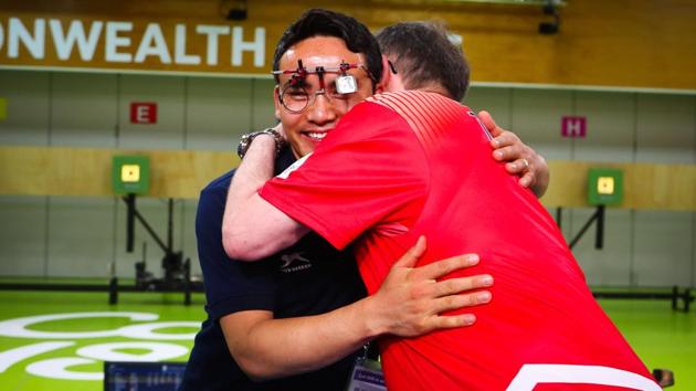 India’s Jitu Rai (L) is congratulated following his victory in the men’s 10m air pistol shooting final. Rai created a Commonwealth Games record of 235.1 in the final to win gold while Om Prakash Mitharwal bagged bronze. (Patrick Hamilton / AFP) India’s Jitu Rai (L) is congratulated following his victory in the men’s 10m air pistol shooting final. Rai created a Commonwealth Games record of 235.1 in the final to win gold while Om Prakash Mitharwal bagged bronze. (Patrick Hamilton / AFP)
