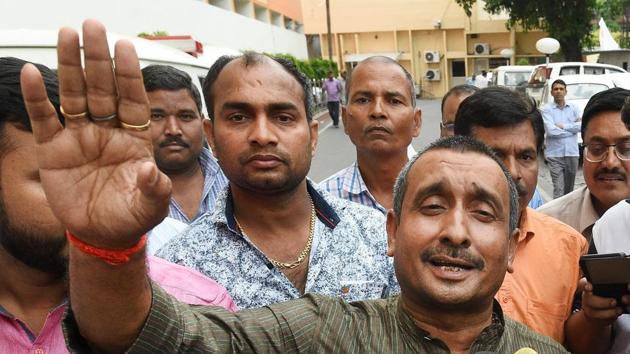 BJP MLA from Unnao Kuldip Singh Sengar speaks to the media outside the chief minister's office in Lucknow on Monday. A woman from Unnao has alleged that the legislator raped her last year. Uttar Pradesh police on Tuesday arrested Sengar’s brother in connection with the alleged custodial death of the victim’s father. (Nand Kumar / PTI File) BJP MLA from Unnao Kuldip Singh Sengar speaks to the media outside the chief minister's office in Lucknow on Monday. A woman from Unnao has alleged that the legislator raped her last year. Uttar Pradesh police on Tuesday arrested Sengar’s brother in connection with the alleged custodial death of the victim’s father. (Nand Kumar / PTI File)