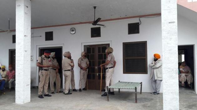 Cops search a room in Gurdwara Baba Gulab Singh Ji at Jharon village of Sangrur.(HT photo)