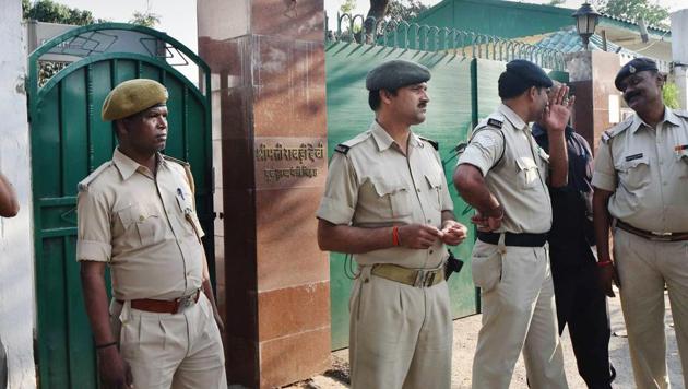 Security personnel stand outside Rashtriya Janata Dal senior leader Rabri Devi's residence to keep her supporters at bay following the CBI questioning her in an IRCTC scam. (PTI) Security personnel stand outside Rashtriya Janata Dal senior leader Rabri Devi's residence to keep her supporters at bay following the CBI questioning her in an IRCTC scam. (PTI)