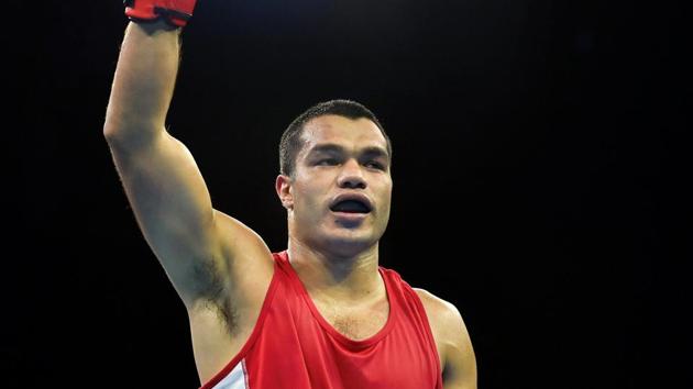 India's Vikas Krishan Yadav celebrates after beating Zambia's Benny Muziyo in the Men's 75kg category quarterfinals boxing event at the Commonwealth Games 2018 at Oxenford Studios in Gold Coast on Wednesday.(PTI)