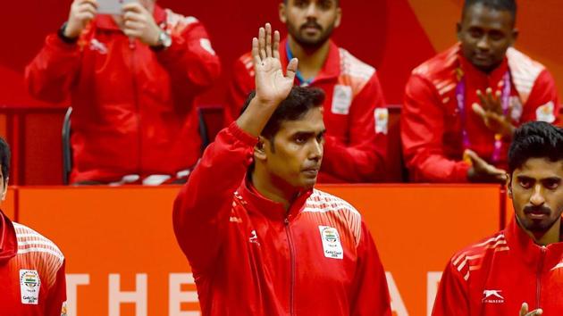 India, led by Achanta Sharath Kamal (in pic), Sathiyan Gnanasekaran and Harmeet Desai, beat Nigeria to win gol din the men's table tennis final at the 2018 Commonwealth Games (CWG 2018) in Gold Coast.(PTI)