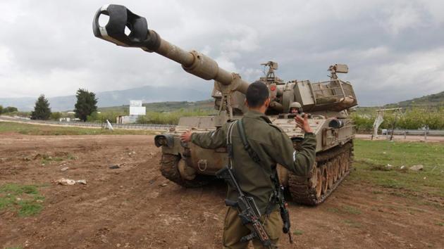 Israeli soldiers take part in training in the Israeli-annexed Golan Heights on April 11, 2018. US President Donald Trump and Western allies are discussing possible military action to punish Syria’s President Bashar Assad for a suspected poison gas attack on Saturday.(AFP)