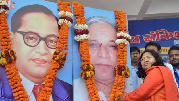 BJP MP Savitri Bai Phule offers tributes to Dalit icons Bhimrao Ambedkar and Kansiram during a rally. The BJP MP from Bahraich alleged the Centre had remained a mute spectator to atrocities against Dalits during the ‘Bharat Bandh’ and the Uttar Pradesh dovernment had failed to check the continuing vandalisation of Dr Bhim Rao Ambedkar’s statues.(PTI File Photo)