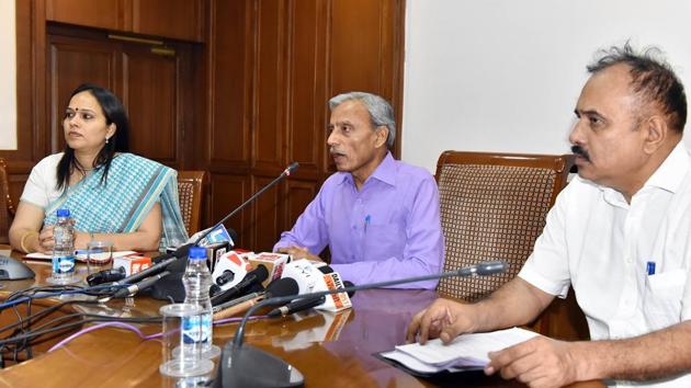 (From right) Kavita Singh, Punjab director of social security, chief commissioner for persons with disabilities Kamlesh Kumar Pandey and deputy commissioner for persons with disabilities, Government of India, Rakesh Kumar Roy.(HT Photo)