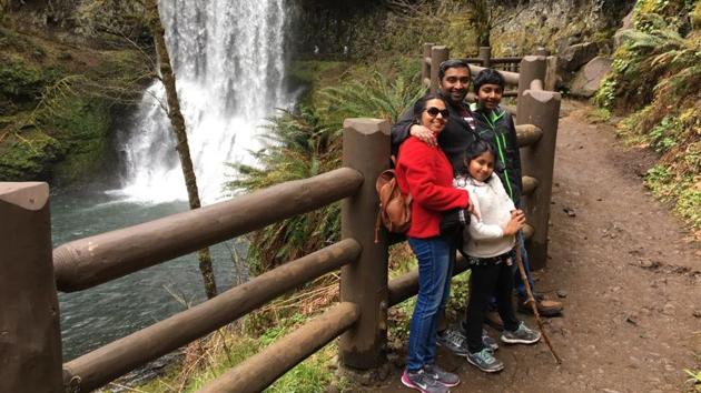 Sandeep Thottapilly, wife Soumya and their two children, Siddhant (12) and Saachi (9) pose during a vacation before they were reported missing while travelling from Portland to Los Angeles in an SUV on April 5.