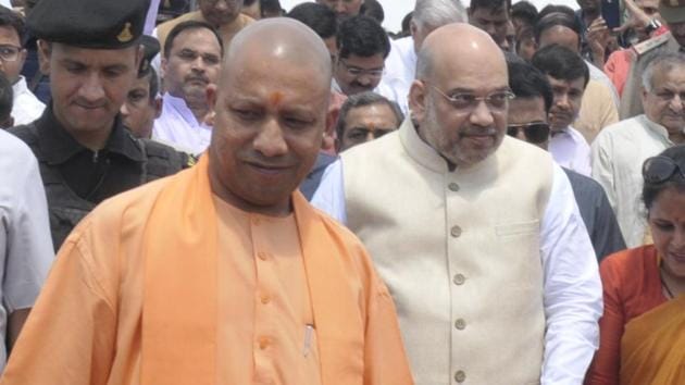 BJP president Amit Shah along with UP chief minister Yogi Adityanath, after paying tribute to social reformer Jyotiba Phule at Samtamulak Chowk in Lucknow.(Deepak Gupta/HT Photo)