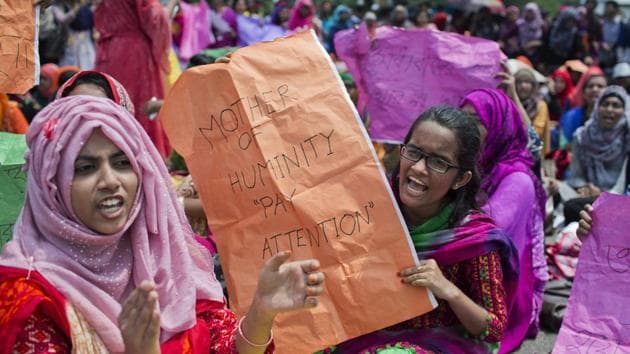 Bangladeshi students hold placards and shout slogans during a protest in Dhaka, Bangladesh, Wednesday, April 11, 2018.(AP Photo)
