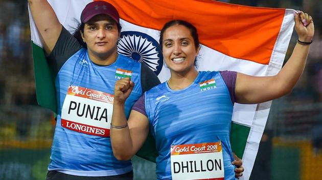 Silver medalist Seema Punia and bronze medalist Navjeet Dhillon of India celebrate their win in the women's discus throw final. (PTI) Silver medalist Seema Punia and bronze medalist Navjeet Dhillon of India celebrate their win in the women's discus throw final. (PTI)
