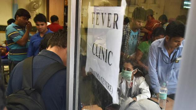 Doctor at a dengue fever emergency clinic at Ram Manohar Lal Hospital in 2016. Public health experts predict a spike following the spell of unseasonal rain this week. (Raj K Raj/HT File Photo) Doctor at a dengue fever emergency clinic at Ram Manohar Lal Hospital in 2016. Public health experts predict a spike following the spell of unseasonal rain this week. (Raj K Raj/HT File Photo)