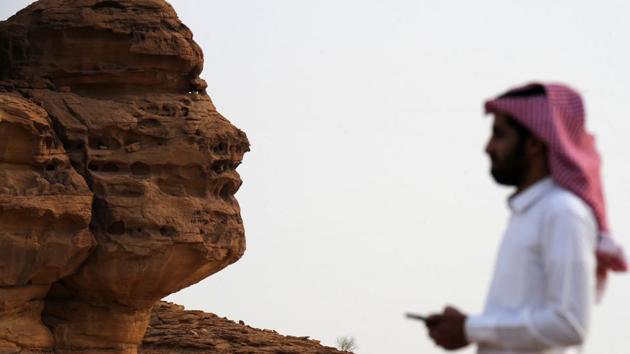A Saudi man visits the Khuraiba archaeological site near al-Ula. “Every day something new is being discovered,” Jamie Quartermaine, an expert from the Britain-based Oxford Archaeology group, told AFP. The Saudi-Franco partnership is in part aimed at preserving the site from further erosion and vandalism. (Fayez Nureldine / AFP) A Saudi man visits the Khuraiba archaeological site near al-Ula. “Every day something new is being discovered,” Jamie Quartermaine, an expert from the Britain-based Oxford Archaeology group, told AFP. The Saudi-Franco partnership is in part aimed at preserving the site from further erosion and vandalism. (Fayez Nureldine / AFP)