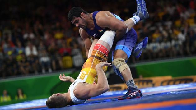 Sushil Kumar handed India their 14th gold and the fourth wrestling medal of the day. (AFP) Sushil Kumar handed India their 14th gold and the fourth wrestling medal of the day. (AFP)