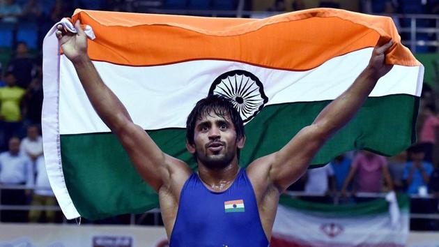 Bajrang Punia continued Indian wrestling’s good run in the 2018 Commonwealth Games, winning gold in the men’s freestyle 65 kg wrestling.(Twitter)