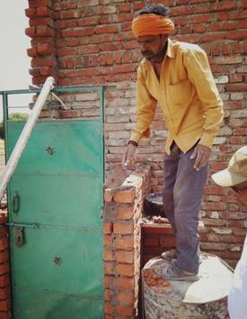 An under construction toilet in gram panchayat Rudhau.(HT Photo)