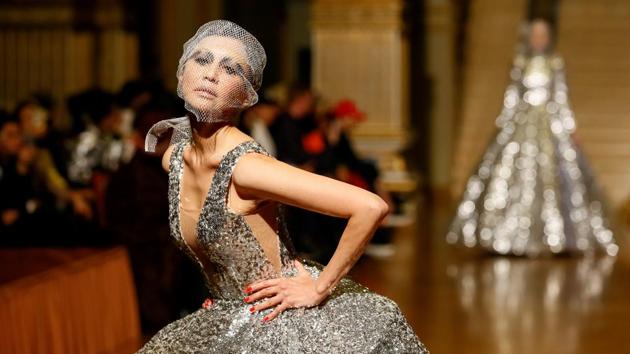 A model presents a creation by designer Naiyl Baikuchukov during Kazakhstan Fashion Week at National Academical Theater of Opera and Ballet in Almaty, Kazakhstan. (Shamil Zhumatov / REUTERS) A model presents a creation by designer Naiyl Baikuchukov during Kazakhstan Fashion Week at National Academical Theater of Opera and Ballet in Almaty, Kazakhstan. (Shamil Zhumatov / REUTERS)