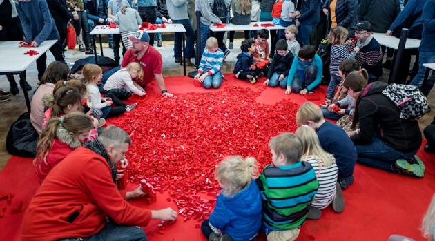 Adults and children play with Lego bricks during the celebrations of the 60th anniversary of the Lego brick, at Lego House in Billund, Denmark, January 28, 2018. The Nordic nations are home to enterprising companies engaged in both old (Statoil, Ikea, Maersk, Lego, Volvo) and new (Nokia, Telenor, Spotify) industries(REUTERS)