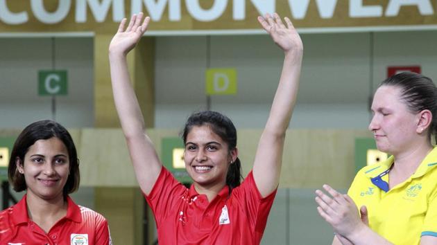 Manu Bhaker of India reacts after winning the gold medal with Heena Sidhu and Australia's Elena Galiabovitch at the Belmont Shooting Centre during the 2018 Commonwealth Games in Brisbane, Australia(AP)