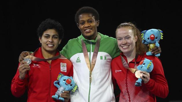 Nigeria's Gold medalist in women's FS 57Kg wrestling Odunayo Adekuoroye overpowered India's Pooja Danda as India continued their medal-winning spree. (AP)