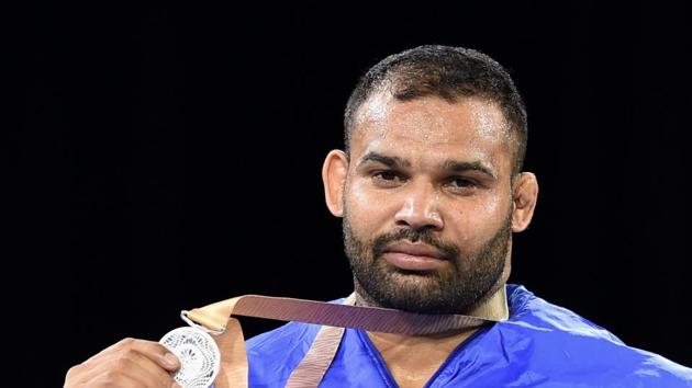 Mausam Khatri failed to make use of his wealth of experience as he settled for a silver after losing his final to South African Martin Erasmus in the men’s freestyle 97 kg event. (PTI)