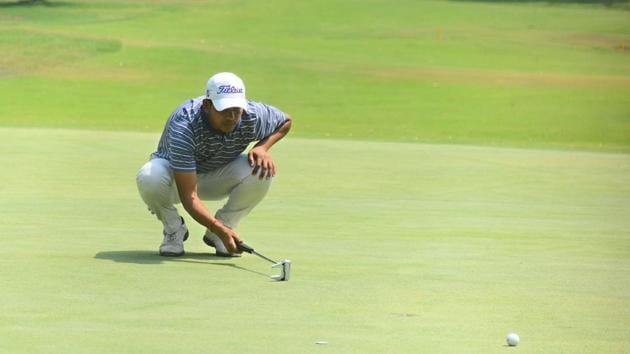 A participant checks his aim during the PGTI tournament in Pune on April 11. (SHANKAR NARAYAN/HT PHOTO) A participant checks his aim during the PGTI tournament in Pune on April 11. (SHANKAR NARAYAN/HT PHOTO)
