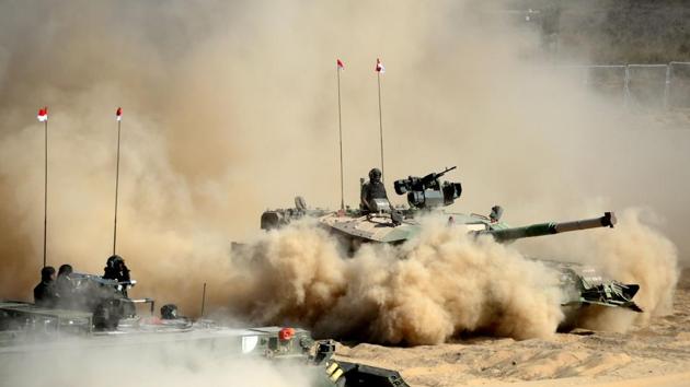 Arjun Mark II tanks drive through sand during a display at the DefExpo 2018, a large defence exhibition showcasing military equipment, on the outskirts of Chennai on April 11, 2018. (Arun Sankar / AFP) Arjun Mark II tanks drive through sand during a display at the DefExpo 2018, a large defence exhibition showcasing military equipment, on the outskirts of Chennai on April 11, 2018. (Arun Sankar / AFP)