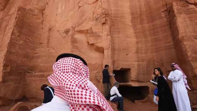 “All of Al-Ula is an open air museum,” Anazi said during a media tour just days before Prince Mohammed’s trip, revealing a patchwork of rock-cut tombs containing niches for burials. The tombs, some containing pre-Islamic inscriptions and drawings such as hunting scenes, are a legacy of the Nabataean artistic tradition. (Fayez Nureldine / AFP) “All of Al-Ula is an open air museum,” Anazi said during a media tour just days before Prince Mohammed’s trip, revealing a patchwork of rock-cut tombs containing niches for burials. The tombs, some containing pre-Islamic inscriptions and drawings such as hunting scenes, are a legacy of the Nabataean artistic tradition. (Fayez Nureldine / AFP)