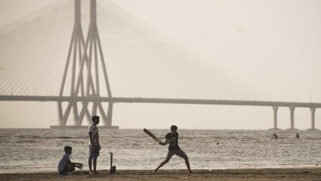An evening cricket match by the Arabian Sea caught at Dadar Chowpatty, with the Bandra-Worli Sealink in the backdrop in Mumbai on April 11, 2018. (Pratik Chorge / HT Photo) An evening cricket match by the Arabian Sea caught at Dadar Chowpatty, with the Bandra-Worli Sealink in the backdrop in Mumbai on April 11, 2018. (Pratik Chorge / HT Photo)