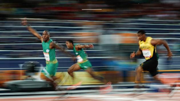 South Africa's Akani Simbine celebrates as he wins the gold medal ahead of South Africa's Henricho Bruintjies (C) and Jamaica's Yohan Blake in the men's 100m final during the 2018 Gold Coast Commonwealth Games at the Carrara Stadium on the Gold Coast, Australia. (Adrian Dennis / AFP) South Africa's Akani Simbine celebrates as he wins the gold medal ahead of South Africa's Henricho Bruintjies (C) and Jamaica's Yohan Blake in the men's 100m final during the 2018 Gold Coast Commonwealth Games at the Carrara Stadium on the Gold Coast, Australia. (Adrian Dennis / AFP)