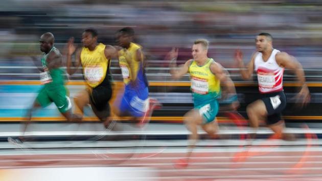 Jamaica’s Yohan Blake (2nd L) competes in the athletics men's 100m semifinal at the Carrara Stadium on April 8, 2018. (Adrian Dennis / AFP)