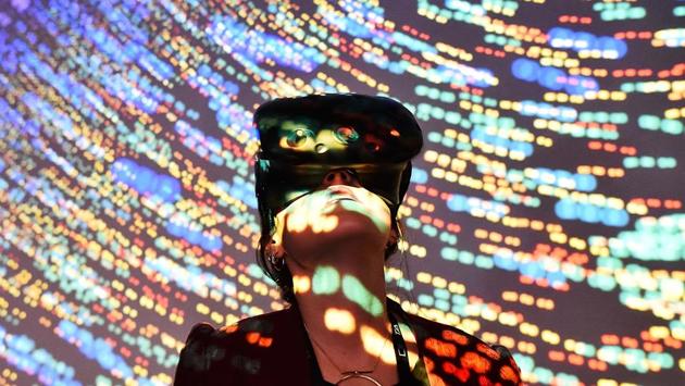 A visitor uses a Virtual Reality (VR) headset during the “Laval Virtual” virtual reality, augmented reality and 3D techonology show, in Laval, France. (Jean-Francois Monier / AFP) A visitor uses a Virtual Reality (VR) headset during the “Laval Virtual” virtual reality, augmented reality and 3D techonology show, in Laval, France. (Jean-Francois Monier / AFP)